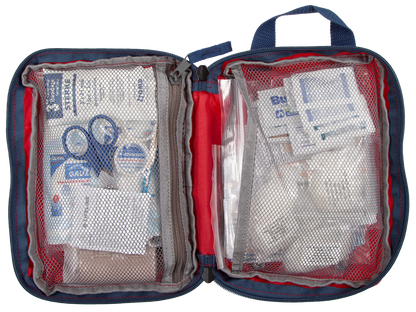 Open first aid kit with various supplies on a white background