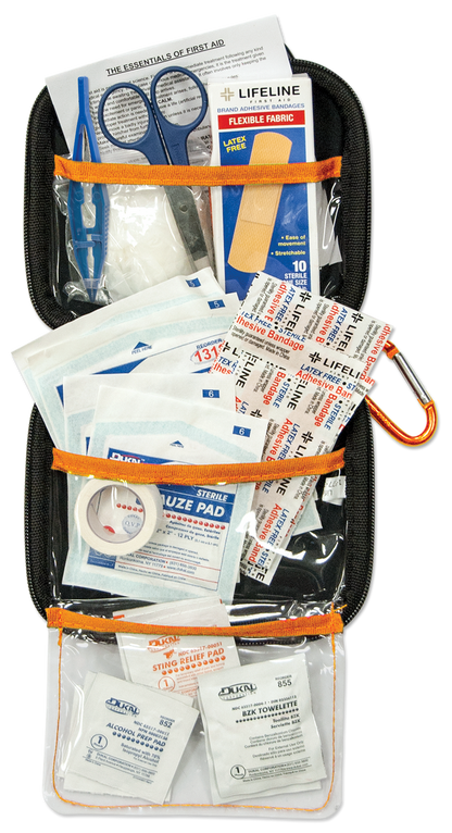 First aid kit with various supplies, including bandages and scissors.