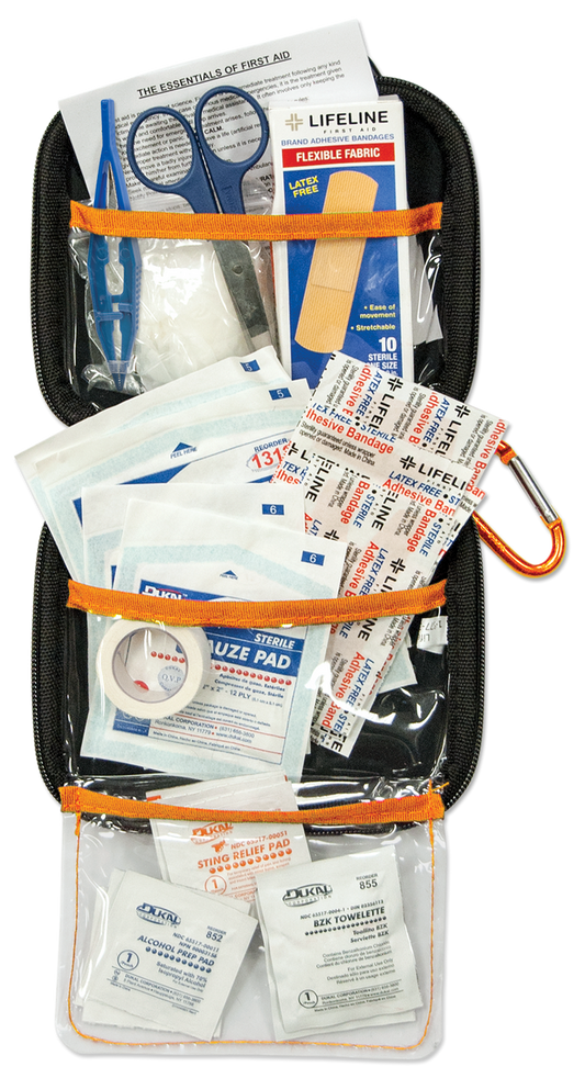 First aid kit with various supplies, including bandages and scissors.